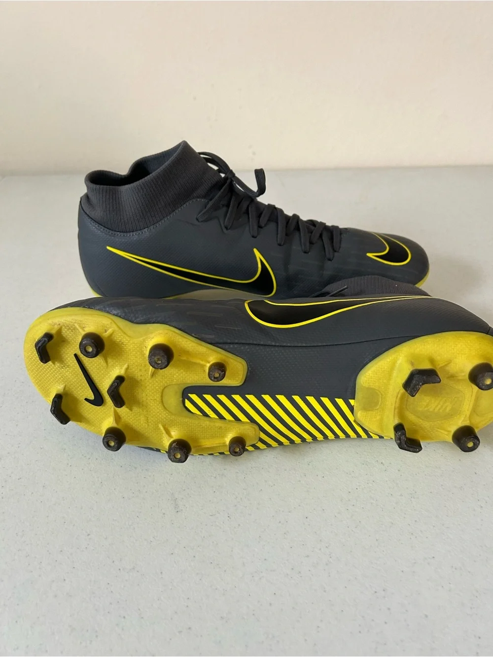 Nike Men’s Black Soccer Cleats with Yellow Swoosh